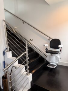 The Pilot Aviator E603 Straight Stairlift with Black Upholstery Pilot Aviator Brown